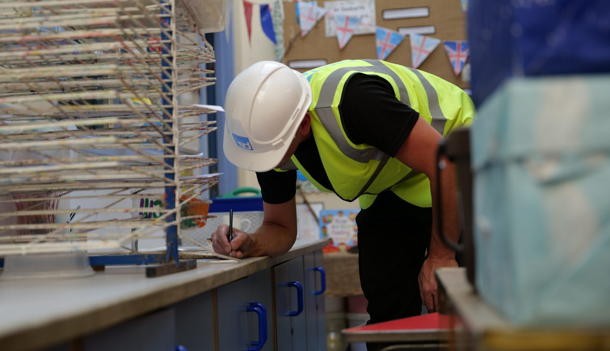 applicator working in a school classroom